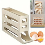 Organização, praticidade e segurança em um só produto! Este Porta Ovos com Dispenser acomoda até 30 ovos distribuídos em 4 andares deslizantes. Seu sistema inteligente permite que os ovos rolem suavemente para frente conforme você retira os de baixo, sempre mantendo os mais antigos acessíveis primeiro. Compacto e moderno, ele otimiza o espaço da geladeira e traz mais agilidade para sua rotina. Ideal para cozinhas grandes ou pequenas!