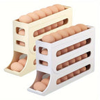 Transforme a forma como você armazena ovos com este Porta Ovos com Dispenser de 4 andares! Perfeito para quem quer evitar ovos quebrados, desperdício e bagunça na geladeira. Com capacidade para 30 ovos, ele oferece um sistema deslizante automático que libera um ovo de cada vez, sempre com segurança. O design empilhável economiza espaço e traz elegância à sua cozinha. Uma escolha prática, inteligente e cheia de estilo!

